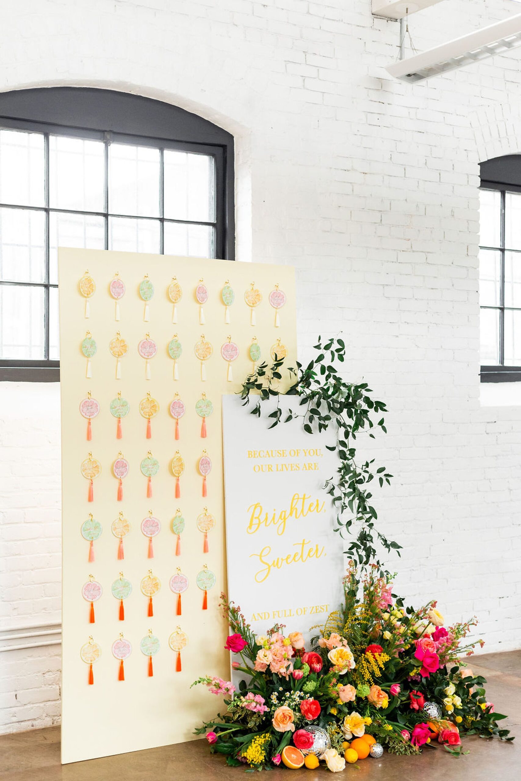 Citrus themed seating chart for New England summer wedding